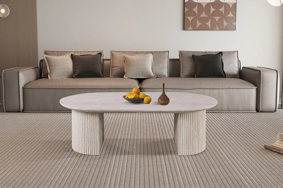 Table basse ovale LYANE effet travertin beige - 120 cm - ROUSSEAU chez TIKAYLA