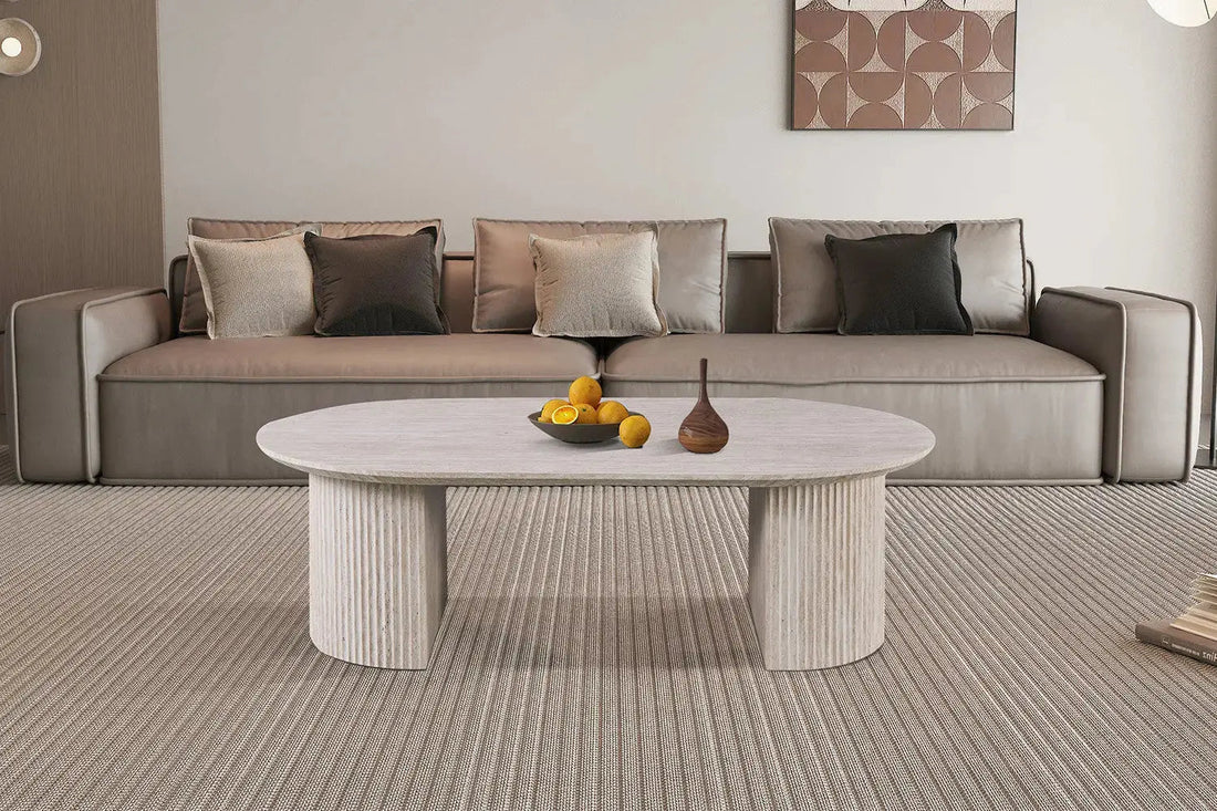 Table basse ovale LYANE effet travertin beige - 120 cm - ROUSSEAU chez TIKAYLA
