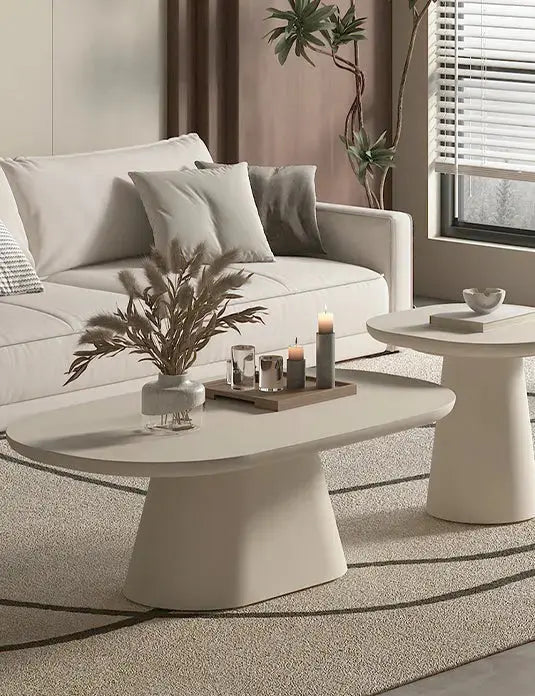 Table basse ronde, ovale ou gigogne en travertin, marbre ou bois TIKAYLA
