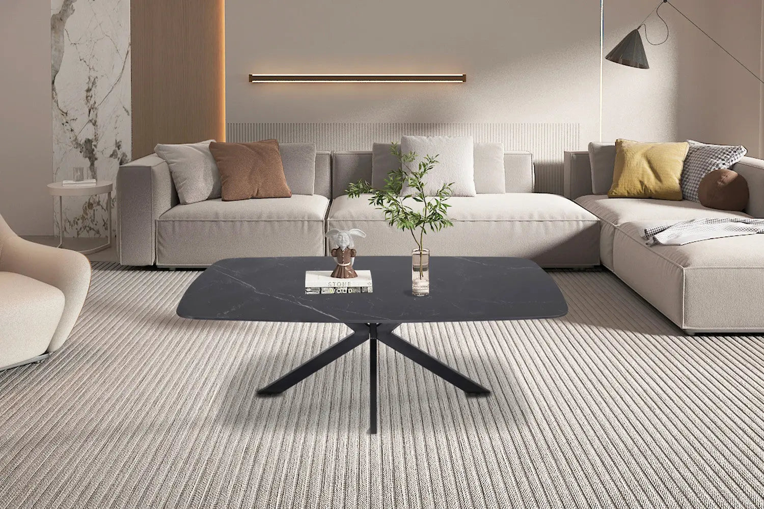 Table basse ovale APOLLINA en pierre - 130 x 70 cm chez TIKAYLA