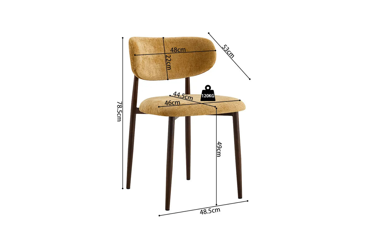 Chaise de salle à manger NONYA en tissu jaune, piètement métal effet bois — en situation
