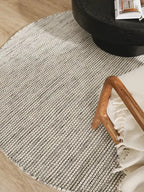 Tapis rond en laine fait main ROCCO beige et noir - BENUTA