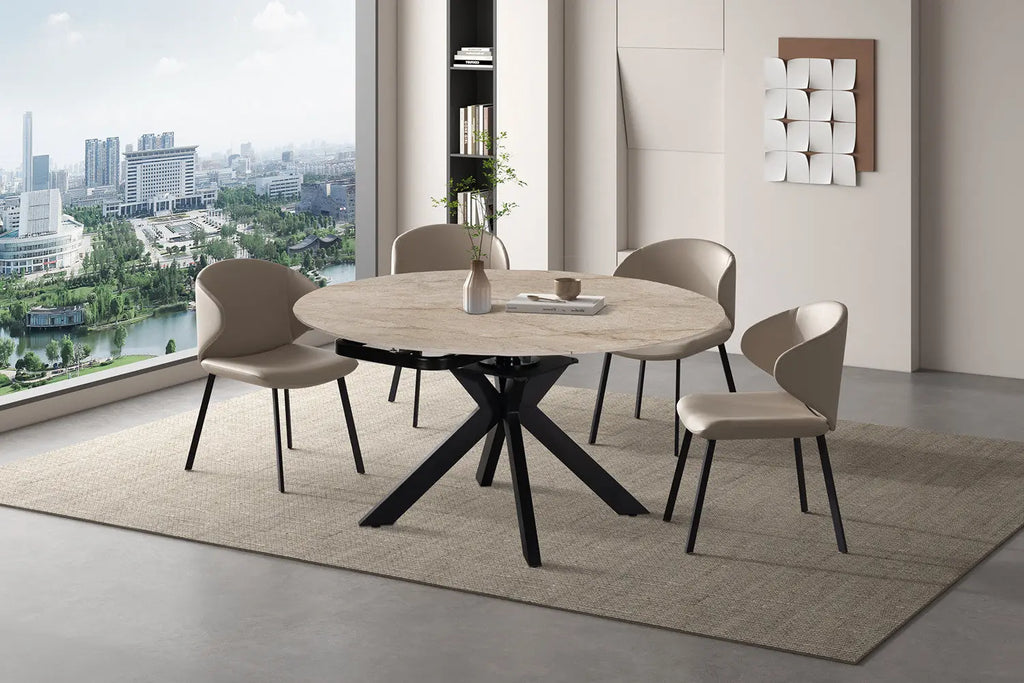 Table extensible ronde ATHENYA en pierre Shakespear Beige — en situation